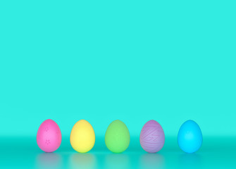 colorful easter eggs on blue green pastels background