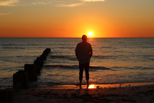 silhouette of a man at sunset