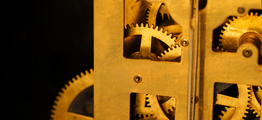 close up of Brass gears of antique watches.