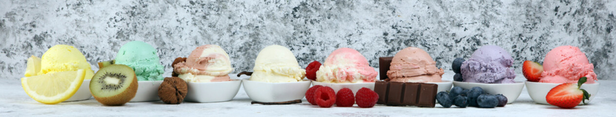 Various of ice cream flavor whit fresh blueberry, strawberry, kiwi, lemon, vanilla setup on rustic background . Summer and Sweet cold ice cream