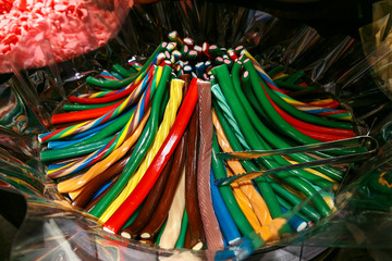 different candies, candies, sweets in a shop window in Venice. Textures and backgrounds with colorful bonbons