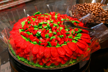 Fototapeta premium different candies, candies, sweets in a shop window in Venice. Textures and backgrounds with colorful bonbons