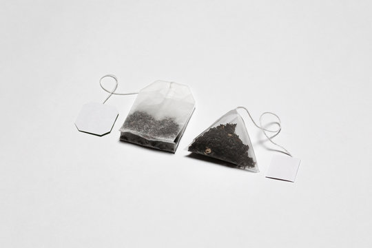 Close-up of Tea Bags Mock up with label isolated on white background.Disposable Tea Bag.High resolution photo.