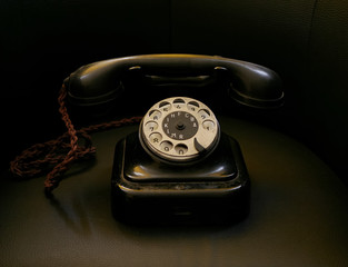 Old desktop telephone set with rotary dial
