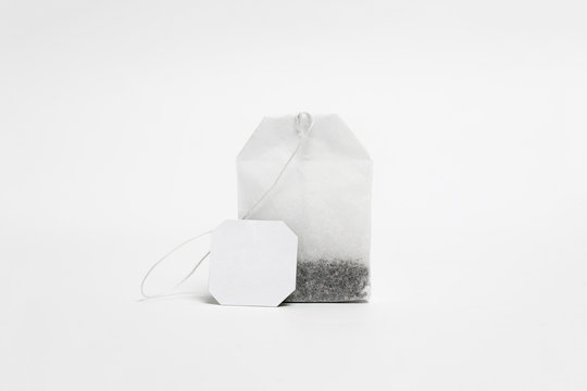 Close-up of Tea Bag Mock up with label isolated on white background.Disposable Tea Bag.High resolution photo.