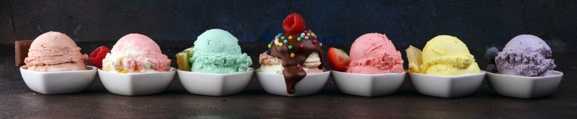 Various of ice cream flavor whit fresh blueberry, strawberry, kiwi, lemon, vanilla setup on rustic background . Summer and Sweet cold ice cream