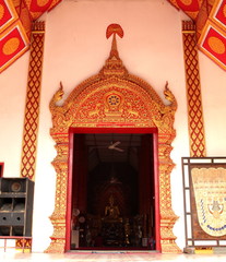 Temple in Chiangmai Thailand Beautifully decorated with wonderful colours statues of Buddha, Payanak, and Monks on walking street in the old city