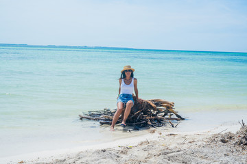 Young indian woman realxed in the beach