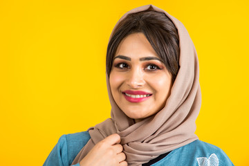 Arabic woman with abaya in studio