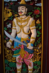 Temple in Chiangmai Thailand Beautifully decorated with wonderful colours statues of Buddha, Payanak, and Monks on walking street in the old city