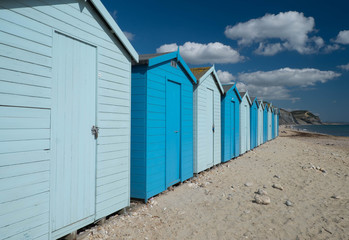 Fototapeta na wymiar English Seaside Huts in Blue 