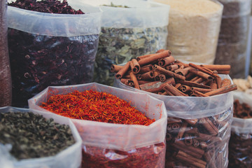 Different types of spices, tea, cinnamon at the bazaar, the traditional street turkish market