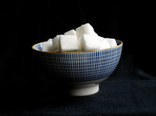 sugar cubes into a bowl