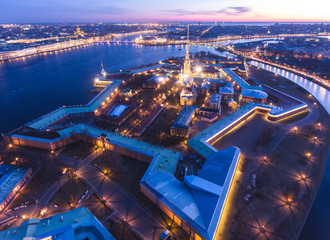 Beautiful night view of Saint-Petersburg, Russia, Peter and Paul Fortress with cityscape and scenery beyond the city
