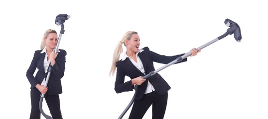 Businesswoman with vacuum cleaner on white