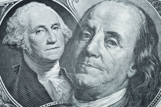 Finance background. Combined image of Benjamin Franklin and George Washington portraits on the US 100 and 1 dollar bill. Macro shot