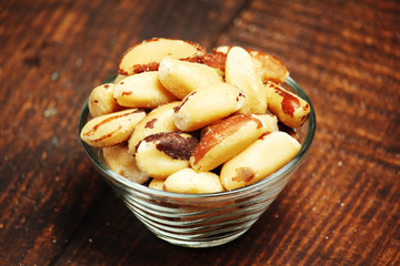 A bowl with peeled Brazil nuts