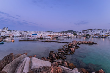 Panoramic view of sunset at popular tourist attraction in Paros island, Naousa town. Promenade zone...