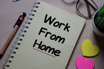 Work from home write on a book isolated on Office Desk