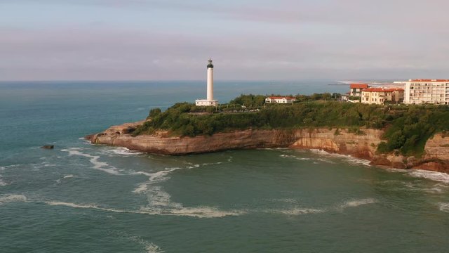 Static drone shot of lighthouse. Atlantic Ocean, Cape Hainsart, Biarritz, France. Phare de Biarritz. 