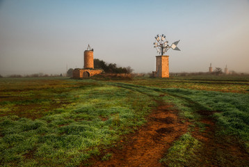 Fototapeta na wymiar windmill at sunrise