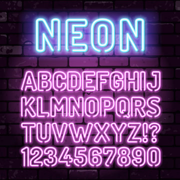 Purple Neon Alphabet on Brick Wall