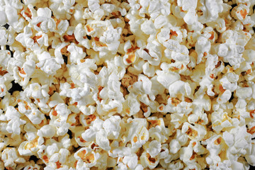 The texture of salted popcorn. Background. View from above.