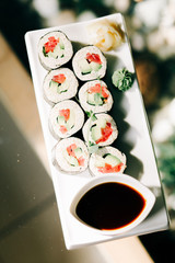 delicious vegan rolls with vegetables on a white plate in a health food restaurant. vegan food