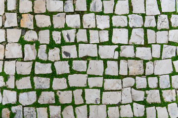 Road stone background texture, street tile texture top view