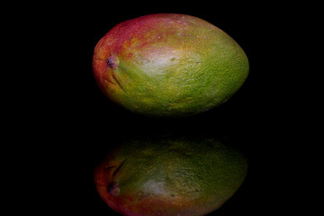 Mango on black background