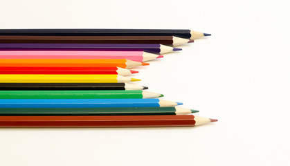  set of colored pencils on a white background