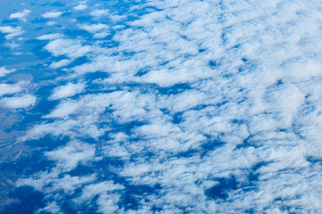 View over the clouds and blue sky.