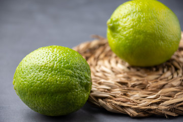 Close-up of two whole files on rope support, and gray background, with selective focus, horizontal