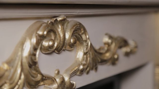Beautiful carving on furniture with gold plating.