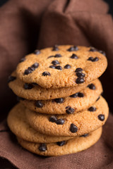 Stacked chocolate oat cookies Close up. Tasty snack and Sweet dessert