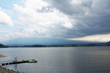 Kawaguchi, Japan - July 31, 2019: Mount Fuji san  in clouds at Lake kawaguchiko in Japan