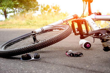 Accident with a bicycle on the road. Wheel closeup. © Юлия Усикова