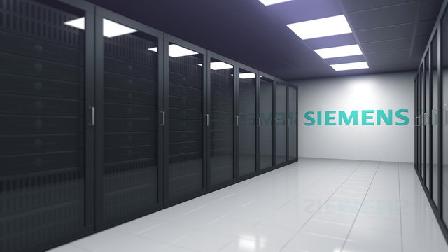 Logo of SIEMENS on the wall of a server room, editorial 3D rendering