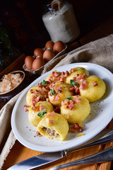 Polish dumplings with meat and mushroom sauerkraut filling