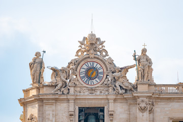 Fototapeta na wymiar Vatican city travel sculpture around the clock tower, tourism.