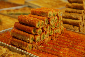 oriental sweets cookies with nuts and honey at the bazaar market