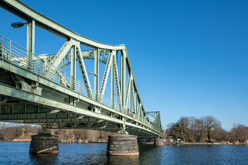 View to the famous Glienicke Bridge, Potsdam, in winter sunny day, named also Bridge of Spies.