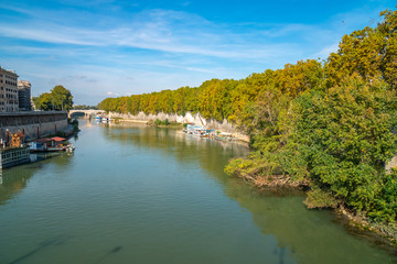 Fototapeta na wymiar The Tiber River in Rome, autumn time.