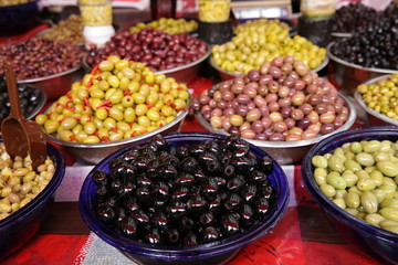 colorful assortment organic olives in the market. Food banner, pattern, background