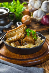 Traditional spare ribs baked in sauerkraut.