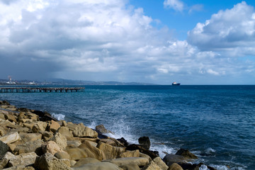 Fototapeta na wymiar Sea, rocks and dramatic sky