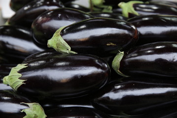 organic eggplant and aubergine on the market. Seasonal vegetables vegetarian concept. Banner, pattern, background.
