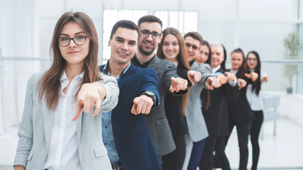 Fototapeta premium large group of young business people are pointing at you