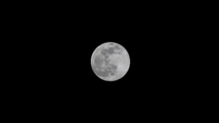 Supermoon, Full Moon, Snow Moon, Hunger Moon in February against a Clear Black Night Sky Background 16 by 9 widescreen