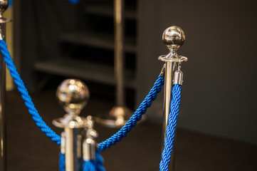 Blue rope at a vip entrance